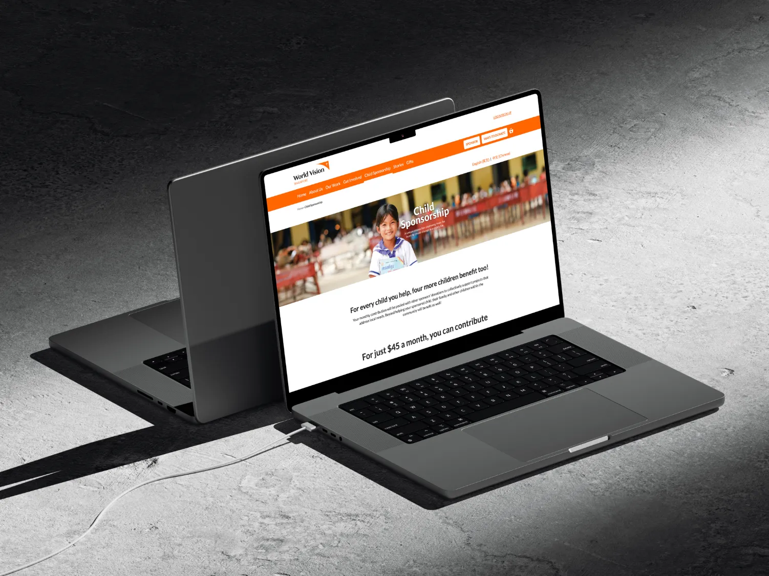 Laptop showing the final sponsor page hero