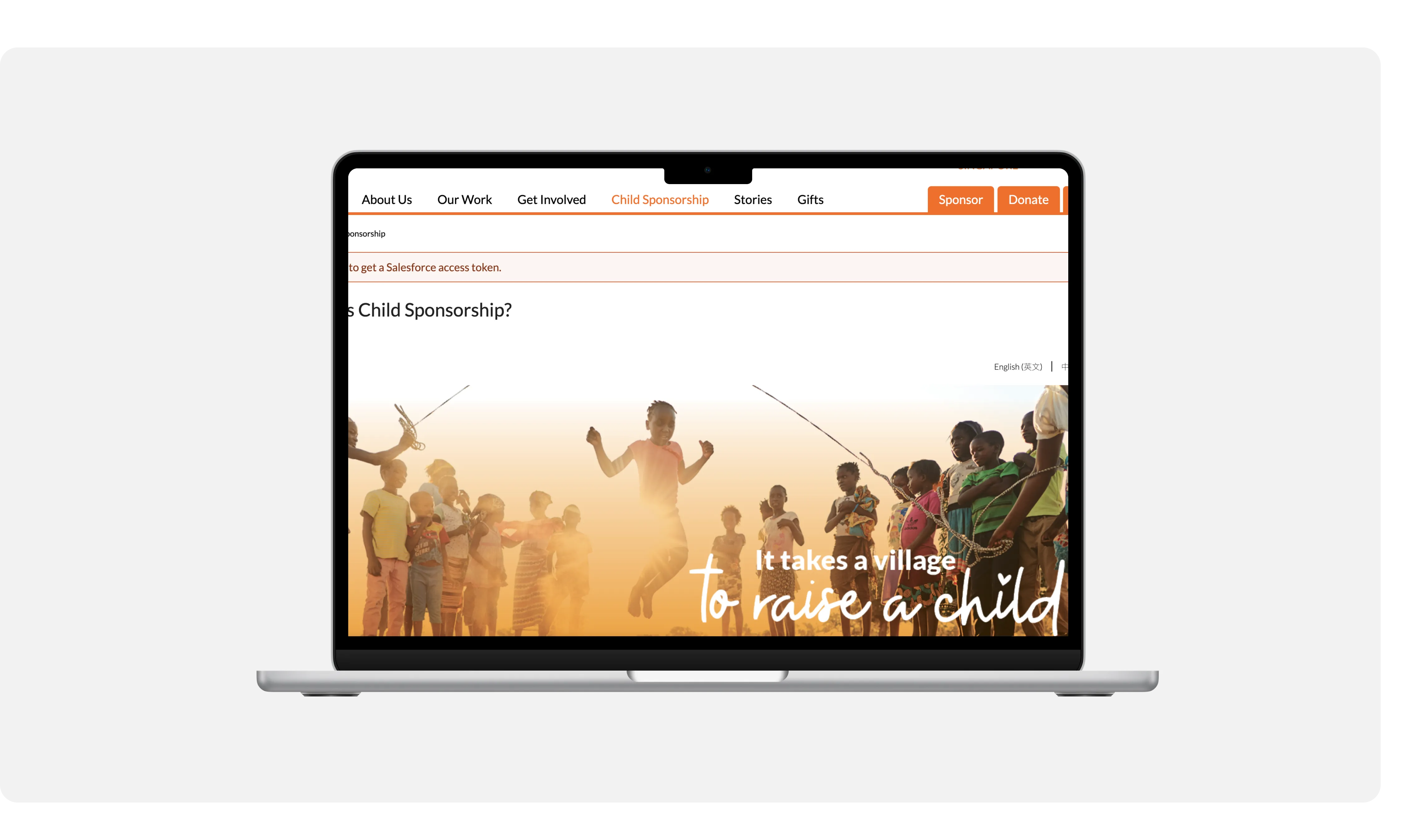 Laptop showing the What is Child Sponsorship page